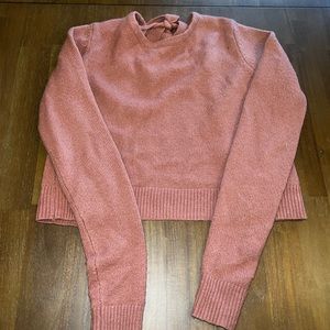 Cute pink sweater!